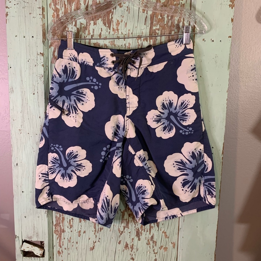 Men’s Blue and white Patagonia hibiscus print swim trunks #surfing #beach
